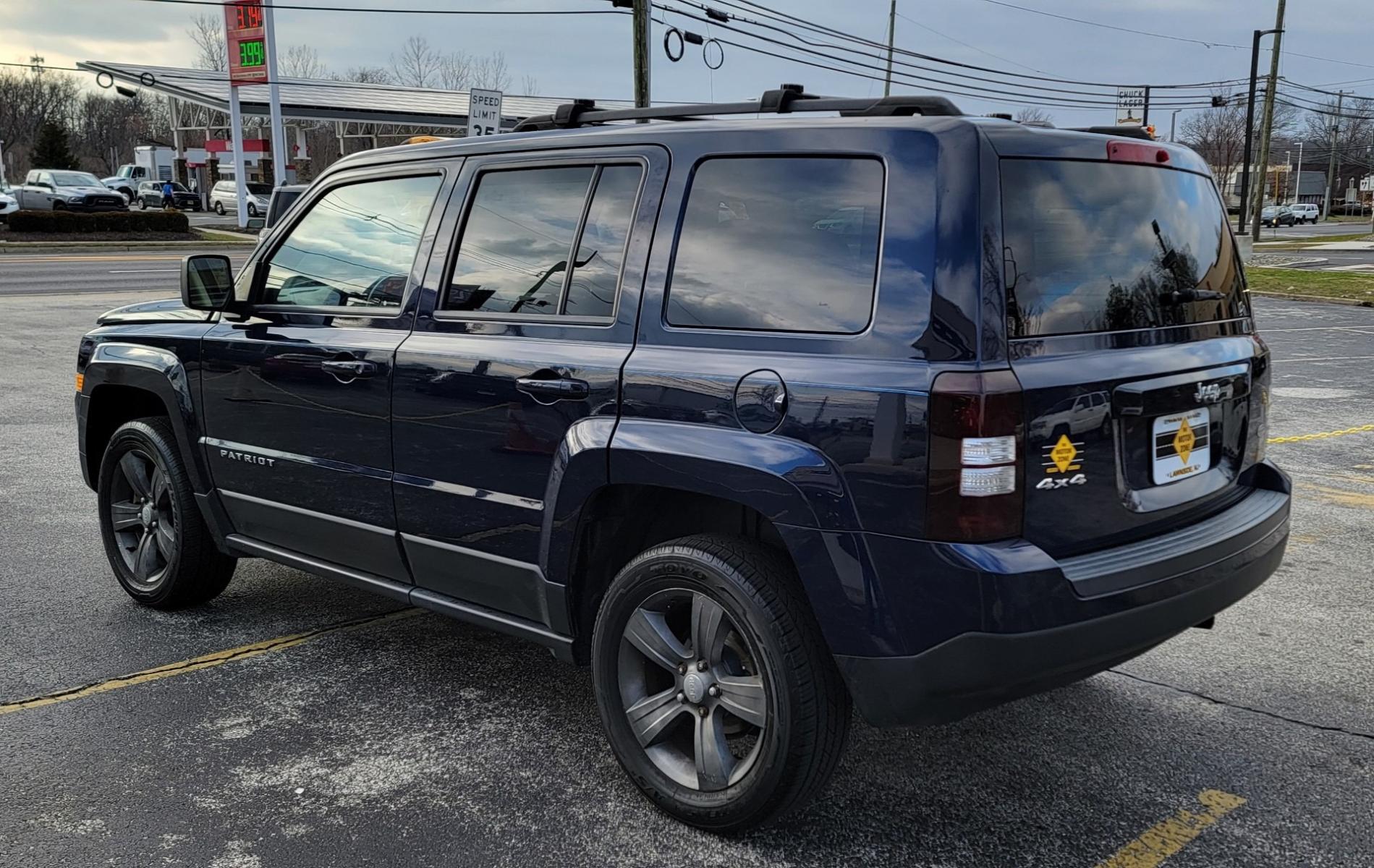 2015 Blue /Black Jeep Patriot Latitude (1C4NJRFB0FD) with an 4-Cyl, 2.4 Liter engine, Automatic transmission, located at 341 N White Horse Pike, Lawnside, NJ, 08045, (856) 262-9500, 39.855621, -75.027451 - Photo #4